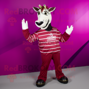 Magenta Quagga mascot costume character dressed with a Long Sleeve Tee and Rings