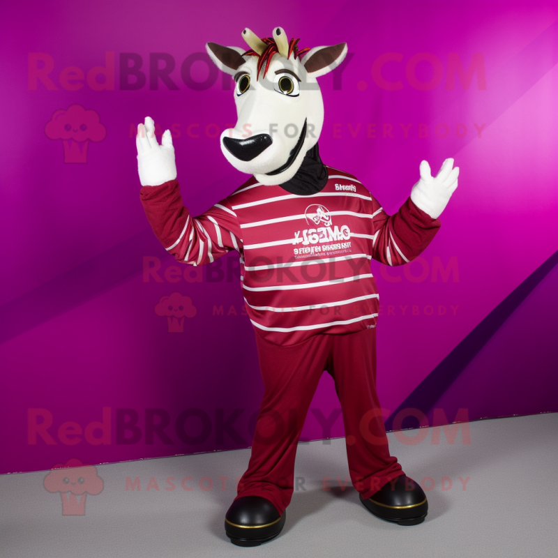 Magenta Quagga mascot costume character dressed with a Long Sleeve Tee and Rings Magenta Quagga mascot costume character dressed with a Long Sleeve Tee and Rings