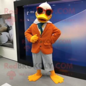 Orange Muscovy Duck mascot costume character dressed with a Suit Pants and Scarves