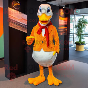 Orange Muscovy Duck mascot costume character dressed with a Suit Pants and Scarves