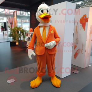 Orange Muscovy Duck mascot costume character dressed with a Suit Pants and Scarves