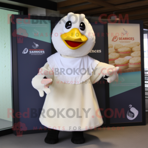 Cream Swans mascot costume character dressed with a Cardigan and Wraps