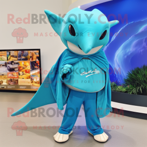 Turquoise Manta Ray mascot costume character dressed with a Chinos and Bracelets