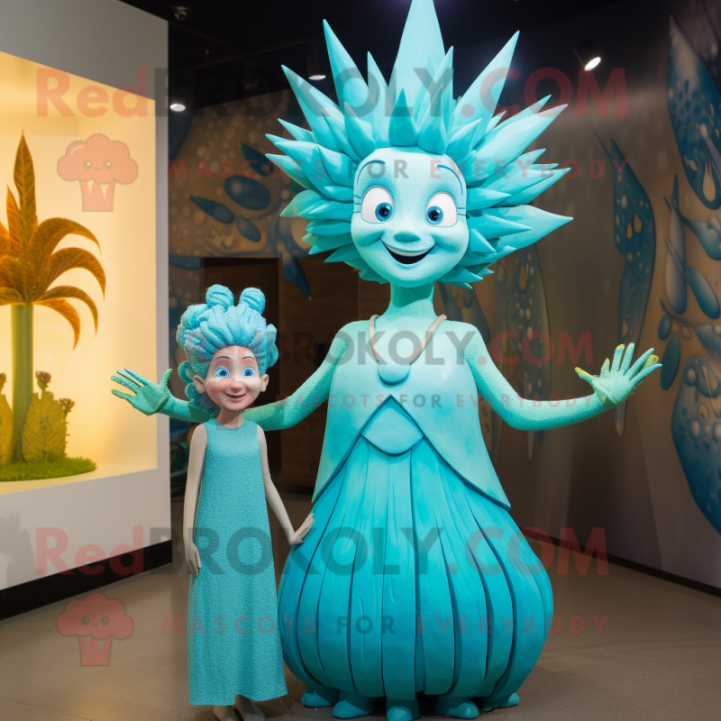 Cyan Queen mascot costume character dressed with a Maxi Dress and Hairpins Cyan Queen mascot costume character dressed with a Maxi Dress and Hairpins