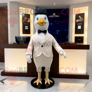 Beige Pigeon mascot costume character dressed with a Tuxedo and Hairpins