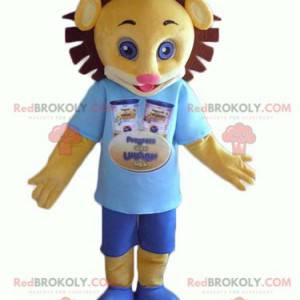 Mascote filhote de leão amarelo e marrom com roupa azul -