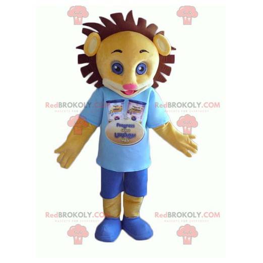 Mascote filhote de leão amarelo e marrom com roupa azul -