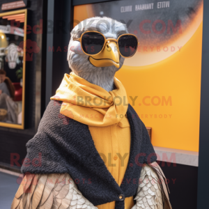 Gold Guinea Fowl mascot costume character dressed with a Cardigan and Sunglasses