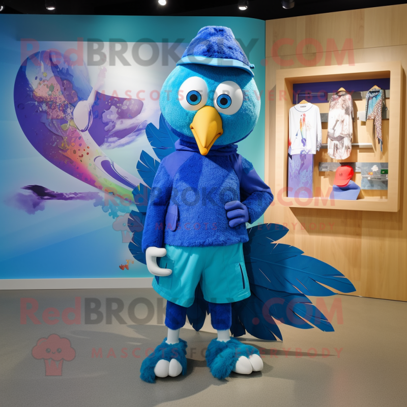 Blue Peacock mascot costume character dressed with a Board Shorts and Caps