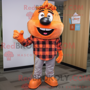 Maskotkarakter af en orange...