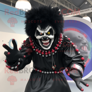 Black Evil Clown mascot costume character dressed with a Jeggings and Rings