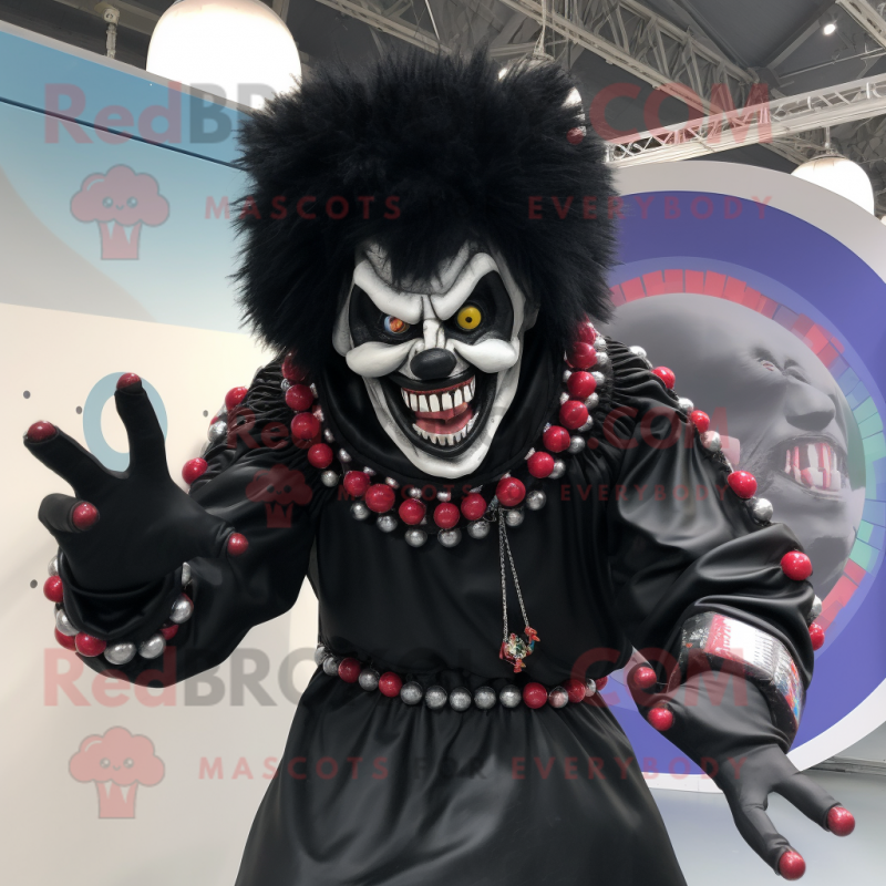 Black Evil Clown mascot costume character dressed with a Jeggings and Rings Black Evil Clown mascot costume character dressed with a Jeggings and Rings