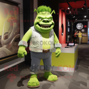 Lime Green Ogre mascot costume character dressed with a Skinny Jeans and Lapel pins