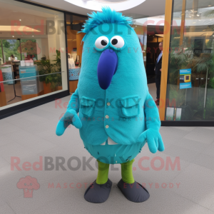 Turquoise Kiwi mascot costume character dressed with a Capri Pants and Pocket squares