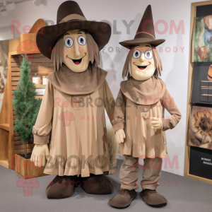 Tan Witch'S Hat mascot costume character dressed with a Dungarees and Ties