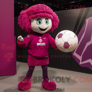 Maskotfigur af en magenta...