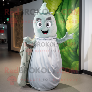 Silver Cucumber mascot costume character dressed with a Maxi Dress and Gloves