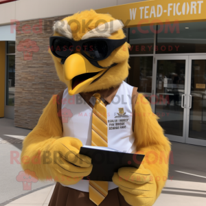 Gold Eagle mascot costume character dressed with a Vest and Reading glasses