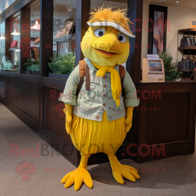 Yellow Quail mascot costume character dressed with a Corduroy Pants and Headbands