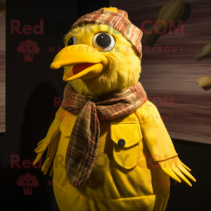 Yellow Quail mascot costume character dressed with a Corduroy Pants and Headbands