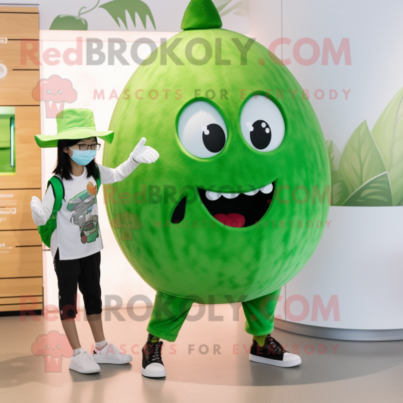 Green Watermelon mascot costume character dressed with a Capri Pants and Watches Green Watermelon mascot costume character dressed with a Capri Pants and Watches