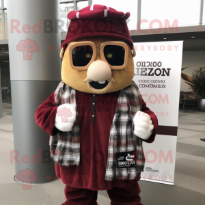 Maroon Chief mascot costume character dressed with a Flannel Shirt and Scarves