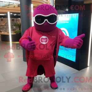 Maskotfigur av en magenta...
