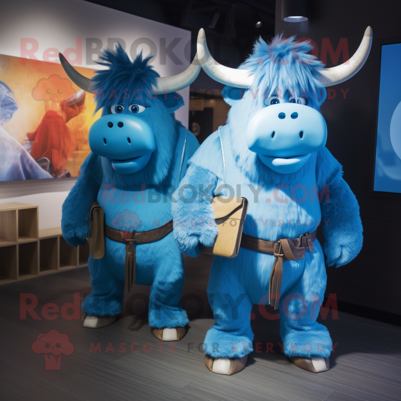 Blue Yak mascot costume character dressed with a Boyfriend Jeans and Belts Blue Yak mascot costume character dressed with a Boyfriend Jeans and Belts
