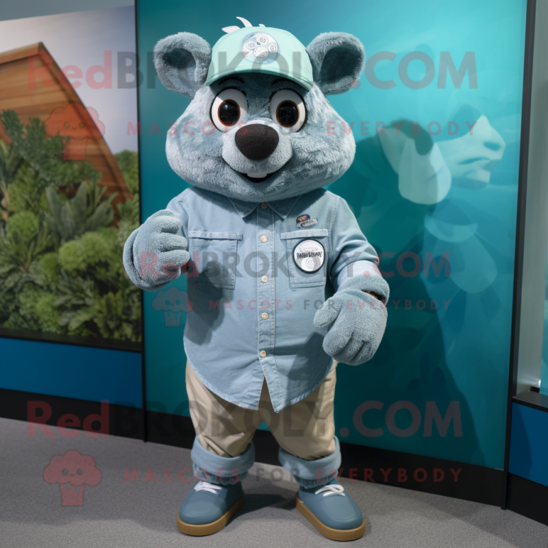 Teal Sow mascot costume character dressed with a Chambray Shirt and Bracelet watches Teal Sow mascot costume character dressed with a Chambray Shirt and Bracelet watches