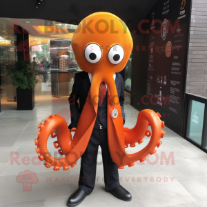 Orange Octopus mascot costume character dressed with a Suit and Shawl pins