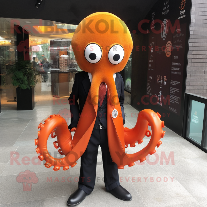 Orange Octopus mascot costume character dressed with a Suit and Shawl pins Orange Octopus mascot costume character dressed with a Suit and Shawl pins