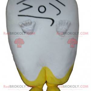 Kæmpe hvid og gul tand maskot gør et ansigt - Redbrokoly.com