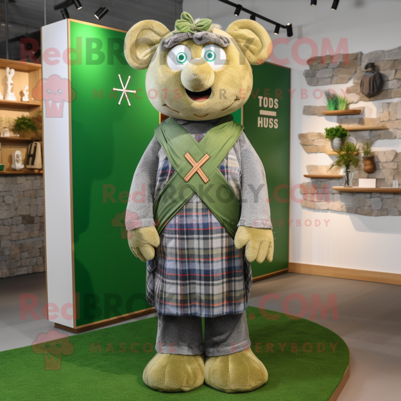 Olive Celtic Cross mascot costume character dressed with a Jeans and Pocket squares Olive Celtic Cross mascot costume character dressed with a Jeans and Pocket squares