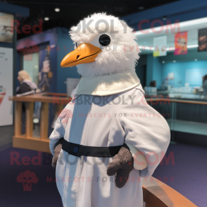 nan Seagull mascot costume character dressed with a Playsuit and Mittens