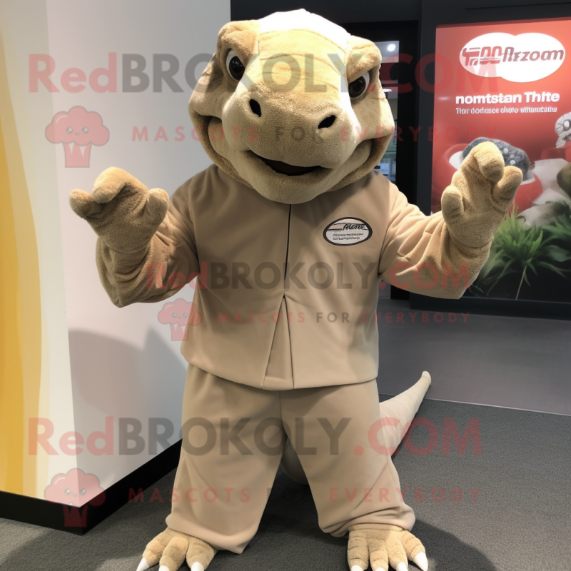 Beige Komodo Dragon mascot costume character dressed with a V-Neck Tee and Gloves