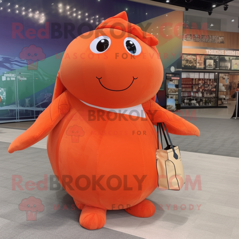 Orange Humpback Whale mascot costume character dressed with a Ball Gown and Tote bags