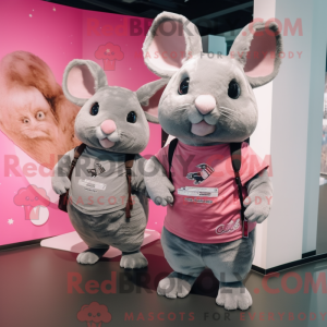 Maskotkarakter av en rosa...