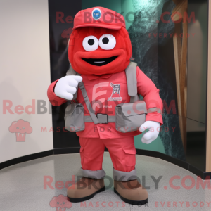 Maskot karakter af en rød...