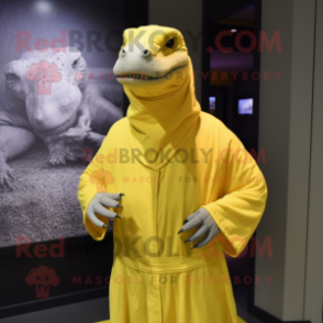 Lemon Yellow Komodo Dragon mascot costume character dressed with a Jumpsuit and Shawls