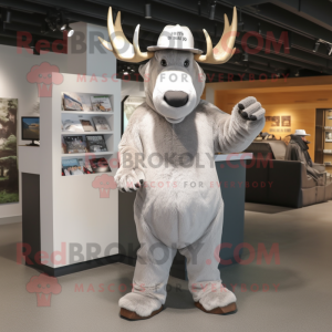 Silver Moose mascot costume character dressed with a T-Shirt and Hat pins
