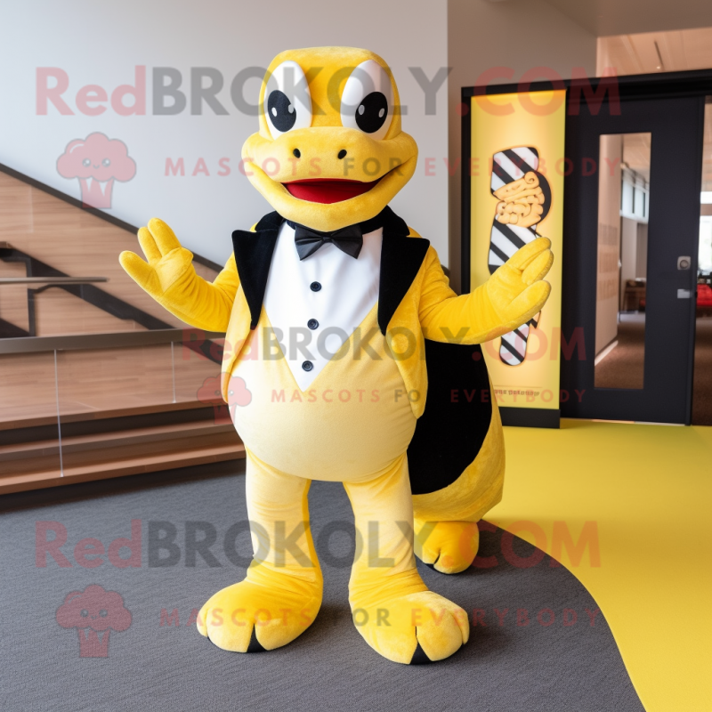 Yellow Python mascot costume character dressed with a Tuxedo and Bow ties