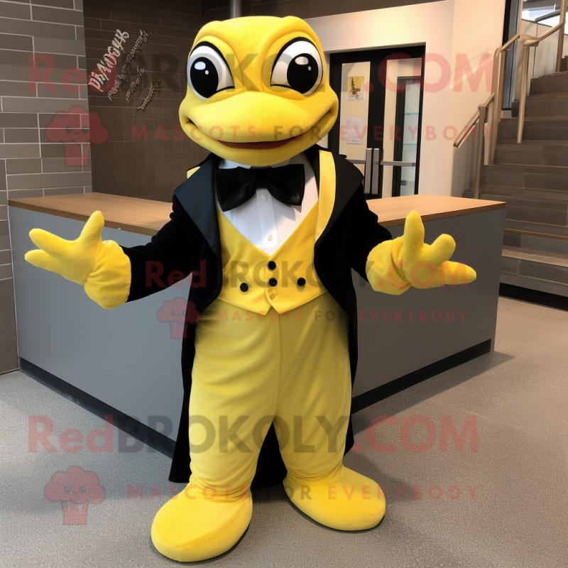 Yellow Python mascot costume character dressed with a Tuxedo and Bow ties Yellow Python mascot costume character dressed with a Tuxedo and Bow ties
