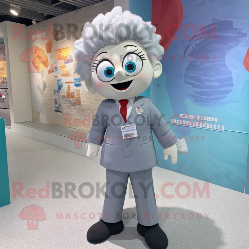 nan Ray mascot costume character dressed with a Suit and Hair clips nan Ray mascot costume character dressed with a Suit and Hair clips