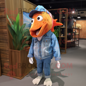 Sky Blue Clown Fish mascot costume character dressed with a Denim Shirt and Shawl pins