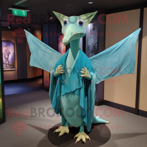 Cyan Pterodactyl mascot costume character dressed with a Dress Shirt and Shawls