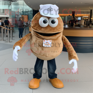 Brown Crab Cakes mascot costume character dressed with a T-Shirt and Beanies
