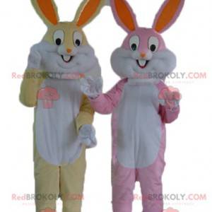 2 mascottes de lapins un jaune et blanc et un rose et blanc -