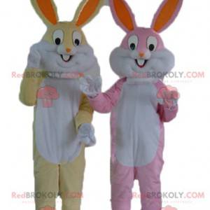 2 rabbit mascots one yellow and white and one pink and white -