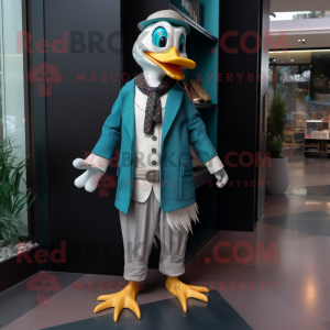 Teal Muscovy Duck mascot costume character dressed with a Suit Pants and Scarves