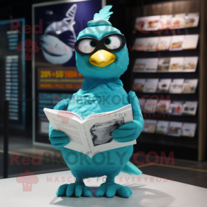 Turquoise Pigeon mascot costume character dressed with a Graphic Tee and Reading glasses